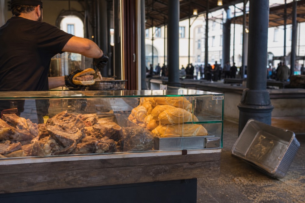 A market stall counter with boiled meat sandwiches in Florence, no text, no logos, no people