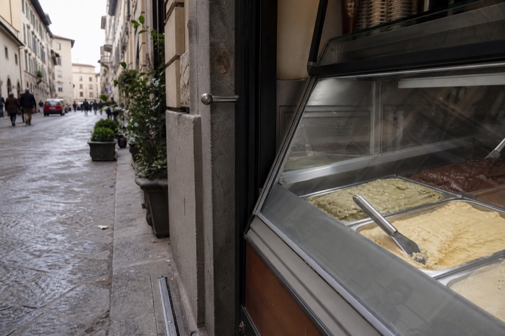 Gelato display with classic flavors, no text, no logos, no people