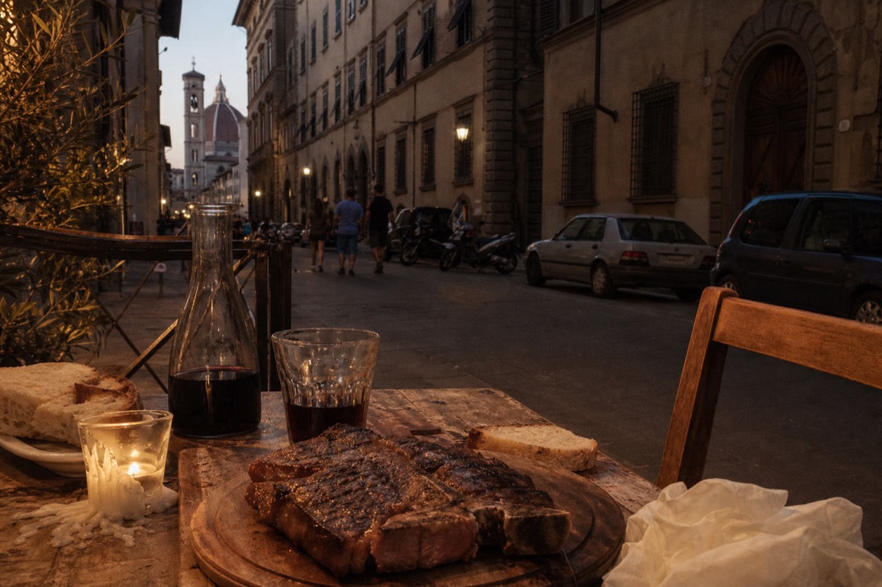 A rustic Florentine table with a grilled T-bone steak, bread and a glass of red wine, no text, no logos, no people