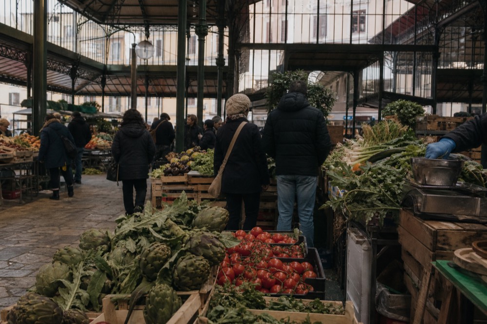 Sant'Ambrogio market hall in Florence with produce stalls, no text, no logos, no people